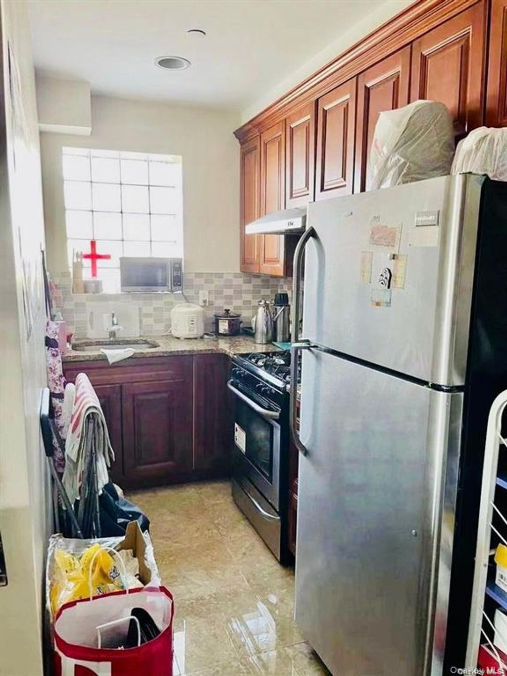 Photo of 82-25 Queens Blvd Blvd #6D, Elmhurst, NY 11373 (MLS # 965735)