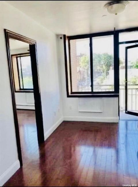 Photo of 82-25 Queens Blvd Blvd #6D, Elmhurst, NY 11373 (MLS # 965735)