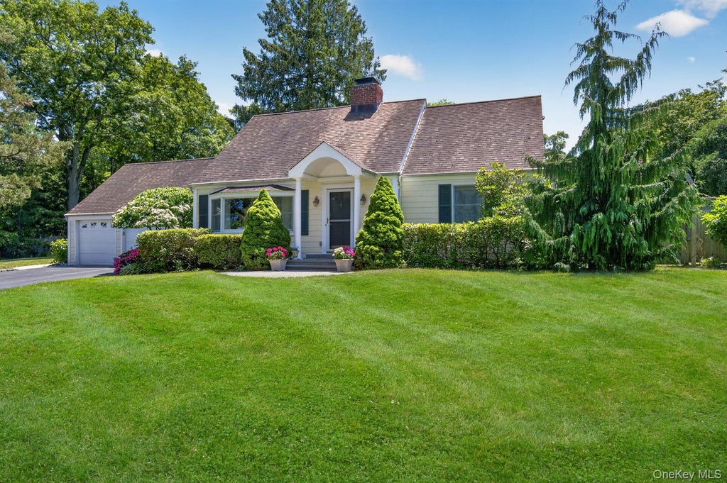 Photo of 52 Cameron Drive, Huntington, NY 11743 (MLS # 1007328)