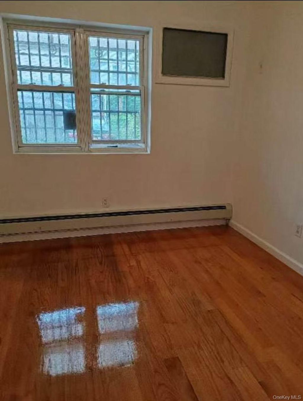 Photo of 4077 Denman Street, Elmhurst, NY 11373 (MLS # 965905)