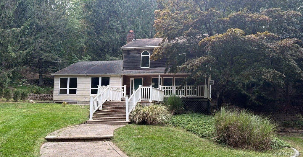 Photo of 56 E Bartlett Road, Middle Island, NY 11953 (MLS # 1057218)