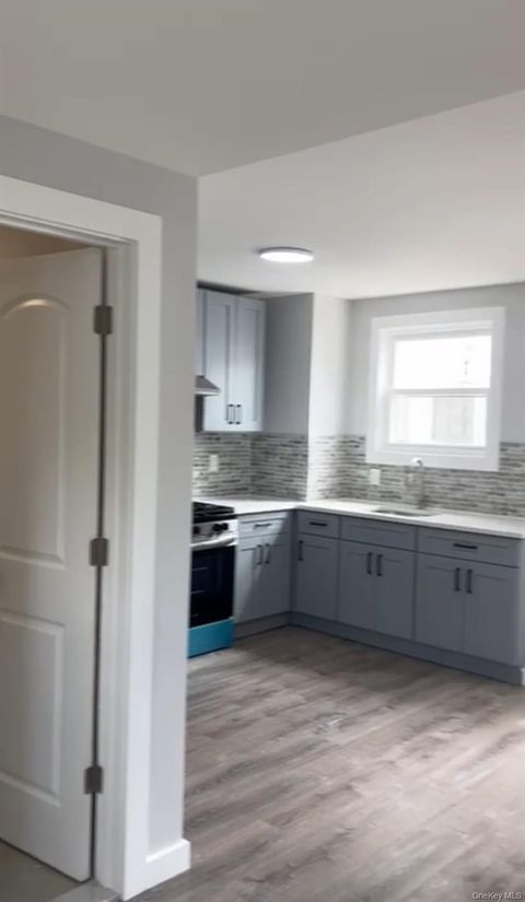 Photo of 9522 Lefferts Boulevard #1, Richmond Hill, NY 11419 (MLS # 989830)