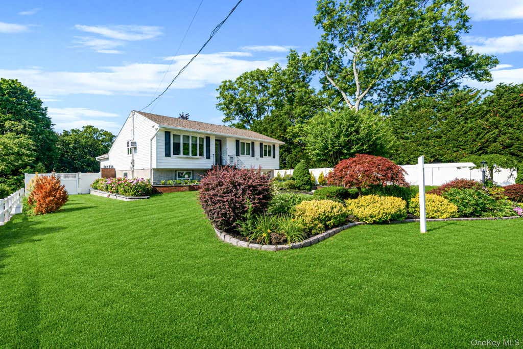 Photo of 22 Milburn Road, Centereach, NY 11720 (MLS # 1025708)