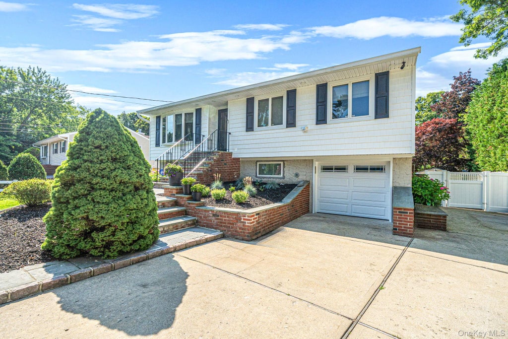 Photo of 22 Milburn Road, Centereach, NY 11720 (MLS # 1025708)