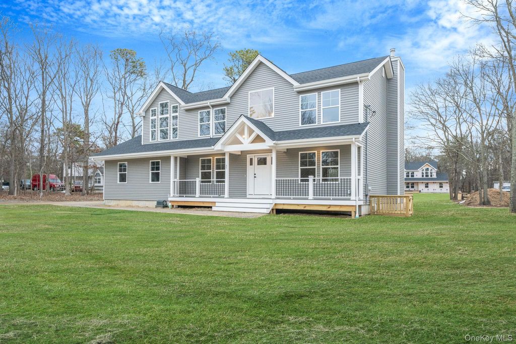 Photo of 63A Blydenburgh Road, Centereach, NY 11720 (MLS # 953435)