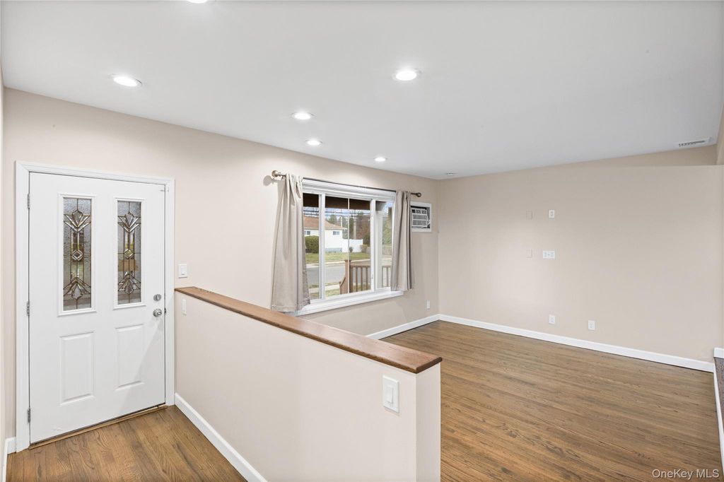 Photo of 1091 Gardiner Drive, Bay Shore, NY 11706 (MLS # 986360)