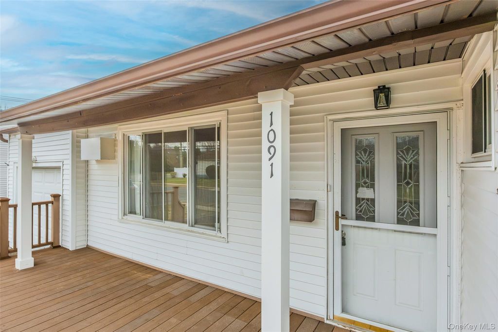 Photo of 1091 Gardiner Drive, Bay Shore, NY 11706 (MLS # 986360)