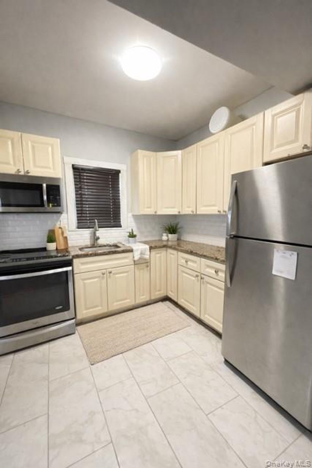 Photo of 316 Beach 45th Street, Far Rockaway, NY 11691 (MLS # 986628)