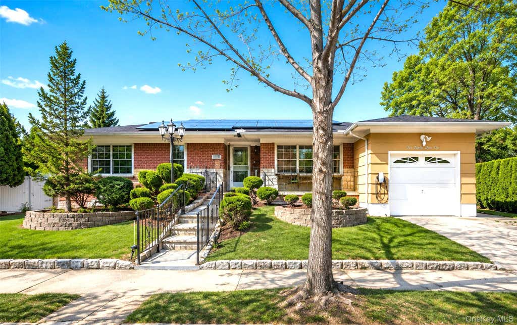 Photo of 218-21 Stewart Road, Hollis Hills, NY 11427 (MLS # 1022013)