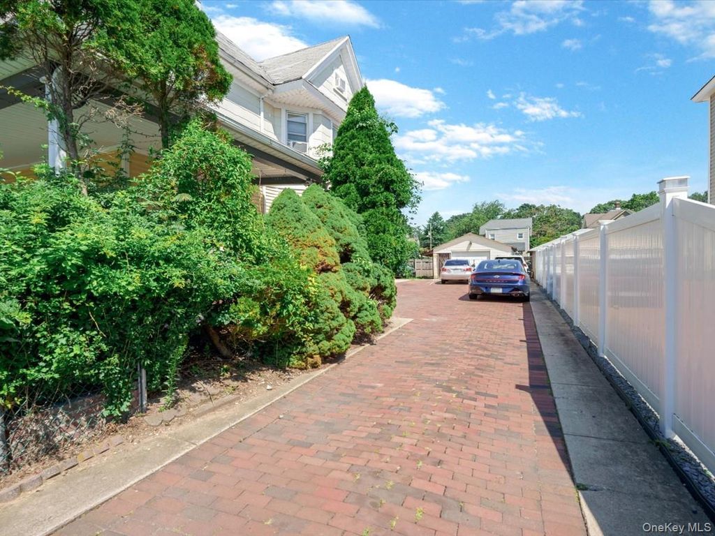 Photo of 36 Russell Place, Freeport, NY 11520 (MLS # 1028410)