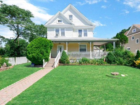 Photo of 36 Russell Place, Freeport, NY 11520 (MLS # 1028410)