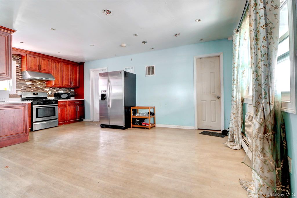 Photo of 15818 85th Avenue, Jamaica, NY 11432 (MLS # 988083)