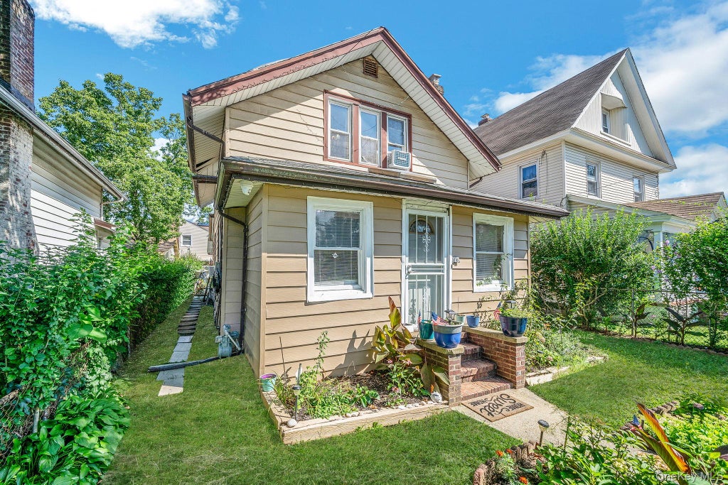 Photo of 173 E Seaman Avenue, Freeport, NY 11520 (MLS # 1022910)