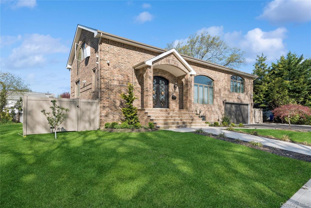 Photo of 783 Oakleigh Road, North Woodmere, NY 11581 (MLS # 951694)