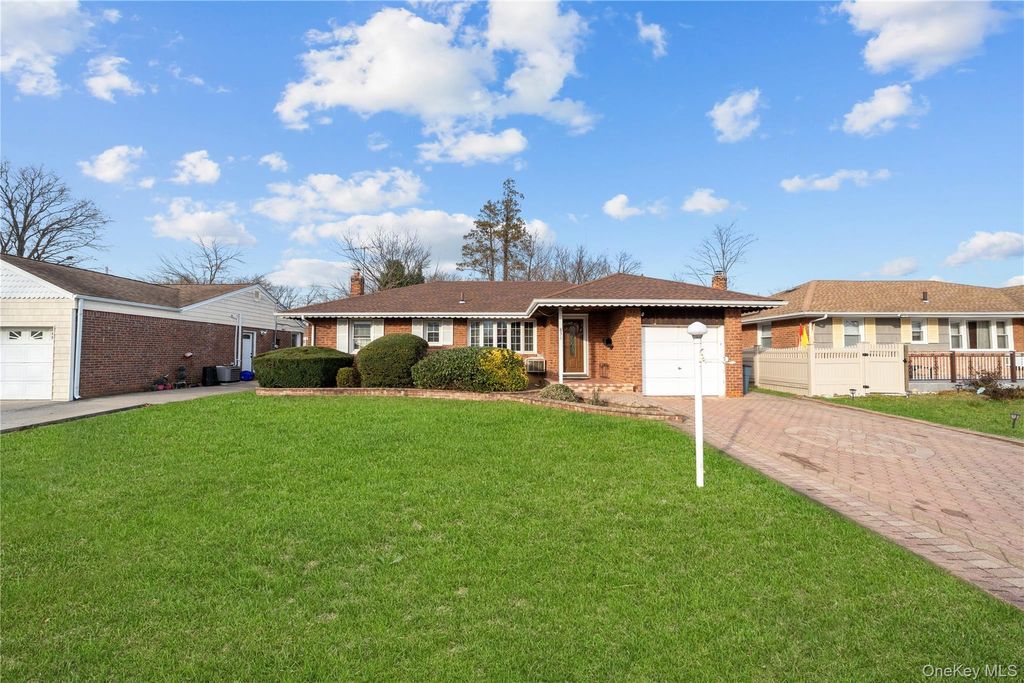 Photo of 831 Dean Drive, Baldwin, NY 11510 (MLS # 943713)