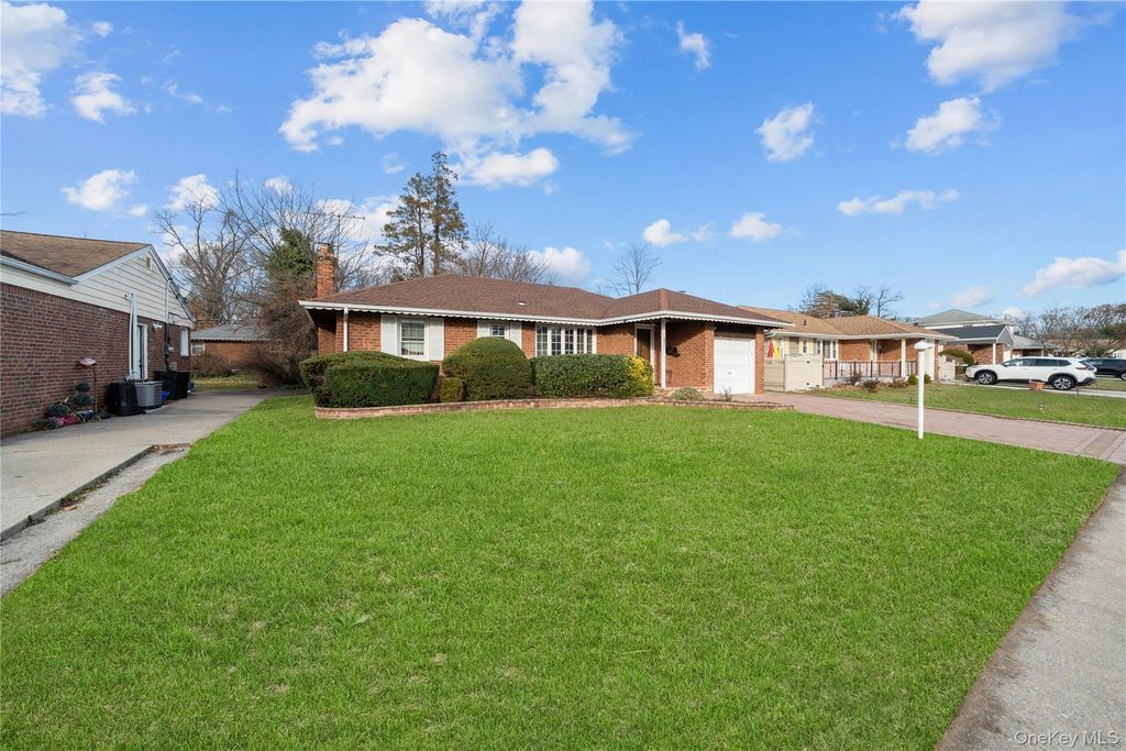 Photo of 831 Dean Drive, Baldwin, NY 11510 (MLS # 943713)