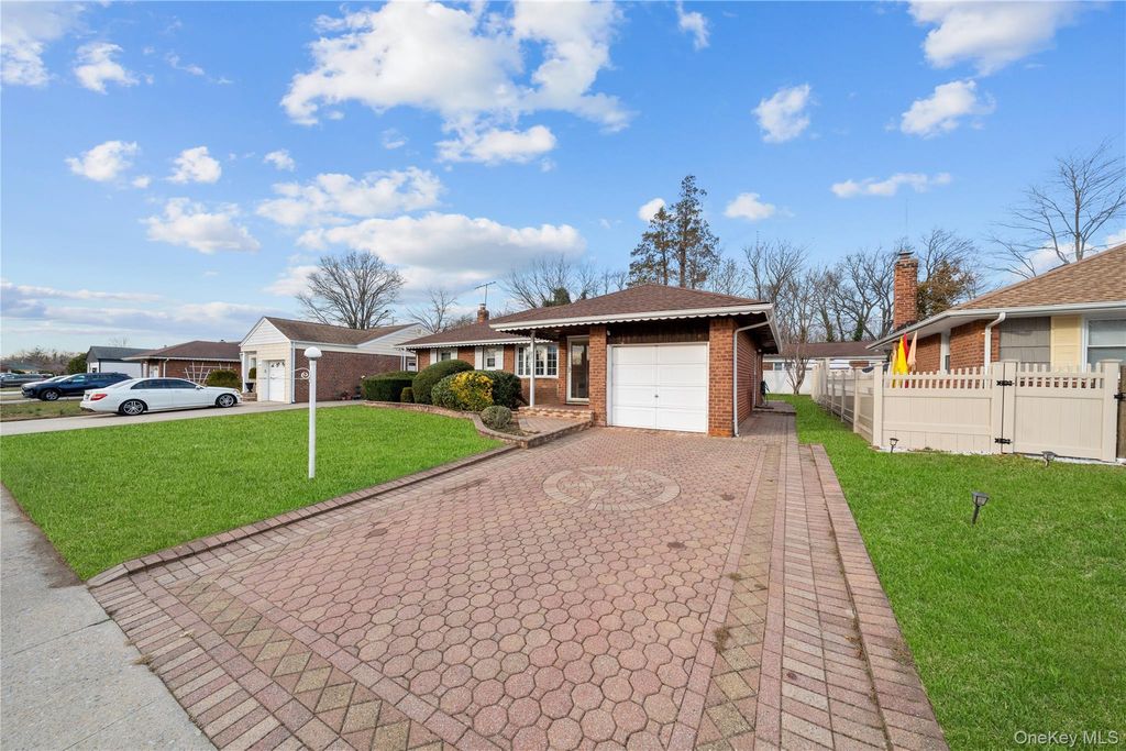 Photo of 831 Dean Drive, Baldwin, NY 11510 (MLS # 943713)