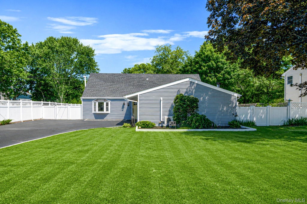 Photo of 457 Peconic Street, Ronkonkoma, NY 11779 (MLS # 1011125)
