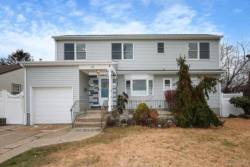 Photo of 828 E. Meadow Avenue, East Meadow, NY 11554 (MLS # 939133)