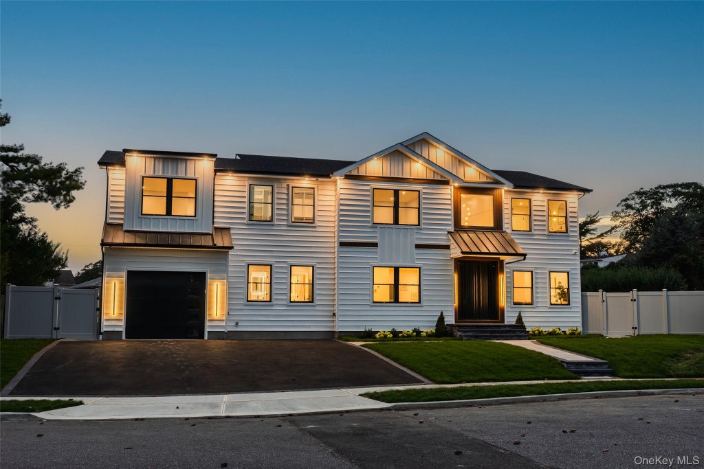 Photo of 712 Bach Court, Westbury, NY 11590 (MLS # 1050109)
