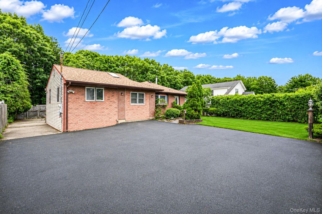 Photo of 119 Chanel Drive E, Shirley, NY 11967 (MLS # 1018809)
