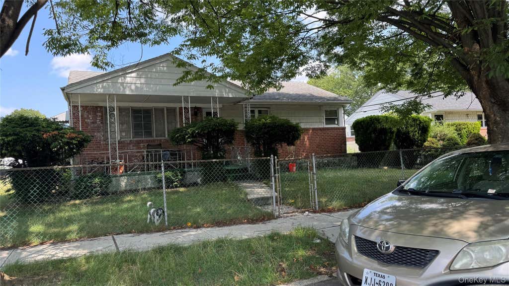 Photo of 12161 238 Street Street, Rosedale, NY 11422 (MLS # 1037191)