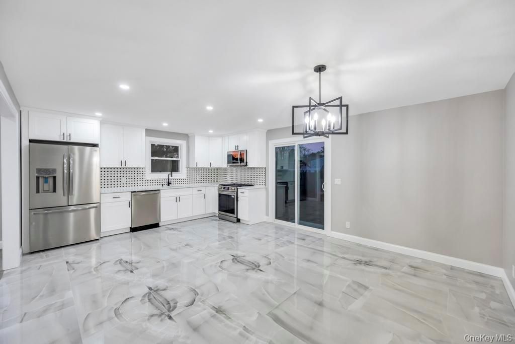 Photo of 27 Ash Street, Central Islip, NY 11722 (MLS # 952941)