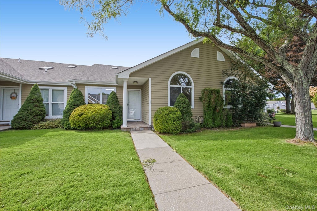 Photo of 65 Eric Drive, Middle Island, NY 11953 (MLS # 1055595)