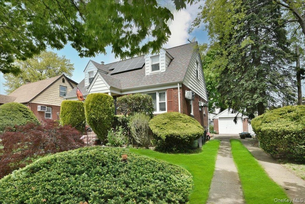 Photo of 246-35 85th Road, Bellerose, NY 11426 (MLS # 994842)