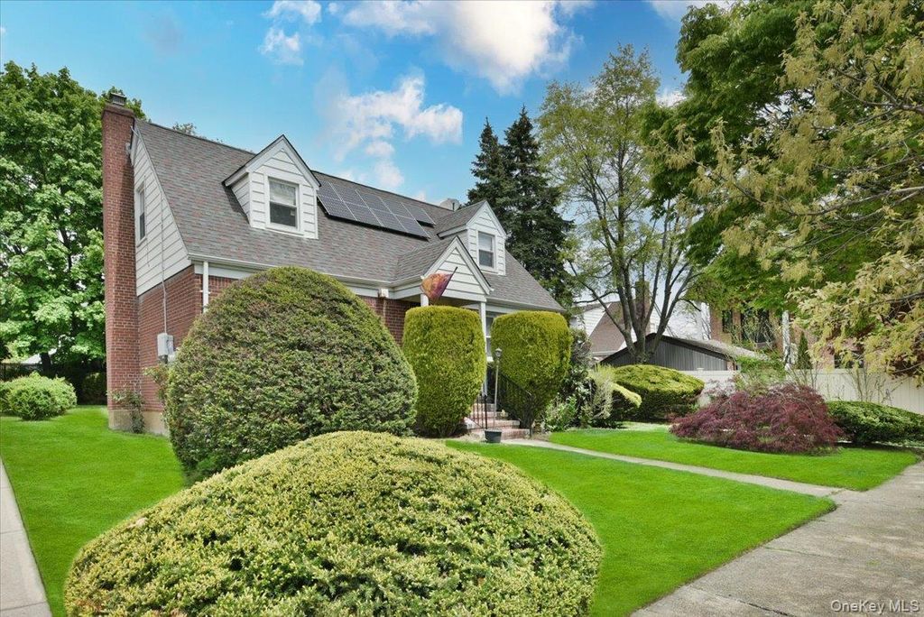 Photo of 246-35 85th Road, Bellerose, NY 11426 (MLS # 994842)