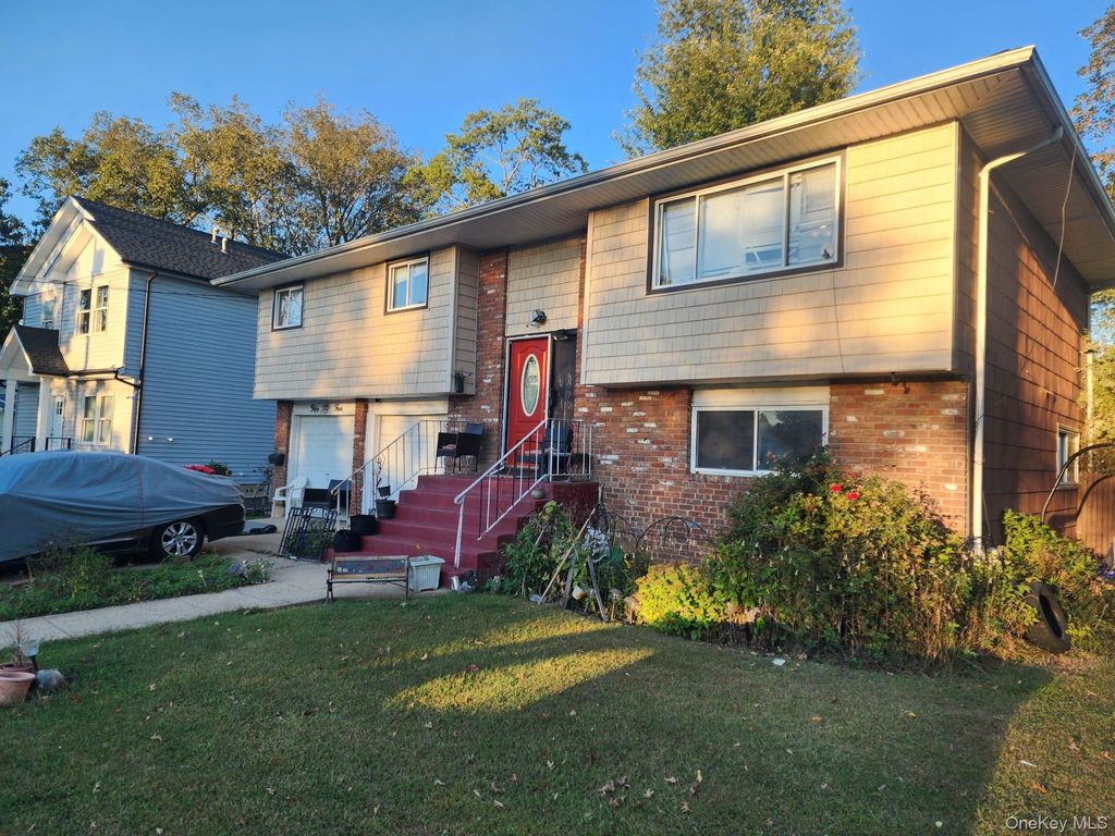 Photo of 54 Westfield Avenue, Roosevelt, NY 11575 (MLS # 922869)