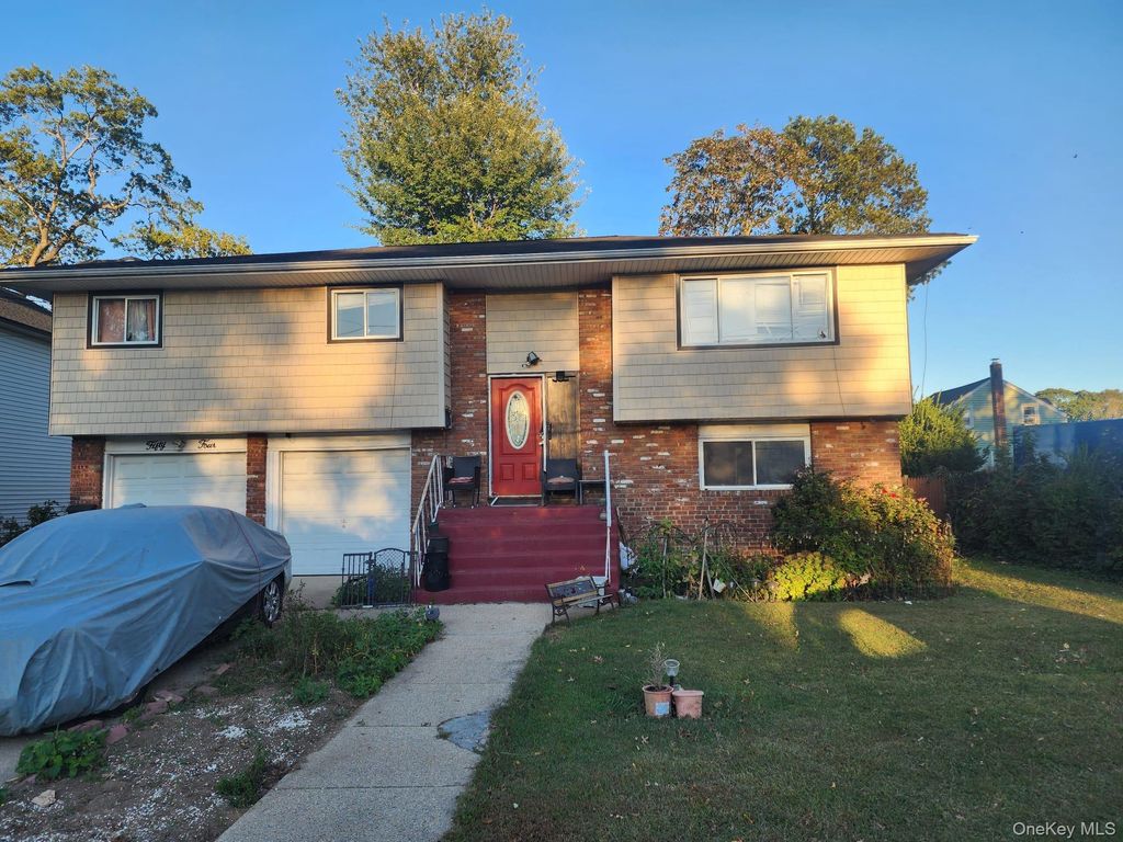 Photo of 54 Westfield Avenue, Roosevelt, NY 11575 (MLS # 922869)