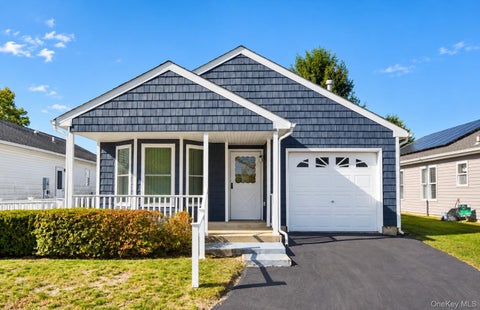 Photo of 5147 Village Circle E, Manorville, NY 11949 (MLS # 1066530)