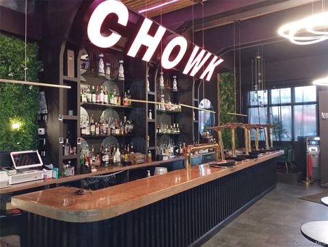 Photo of 59-10 Woodside Avenue, Woodside, NY 11377 (MLS # 967136)