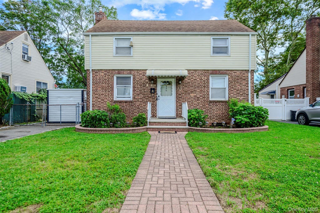 Photo of 596 Irving Street, Westbury, NY 11590 (MLS # 1050482)