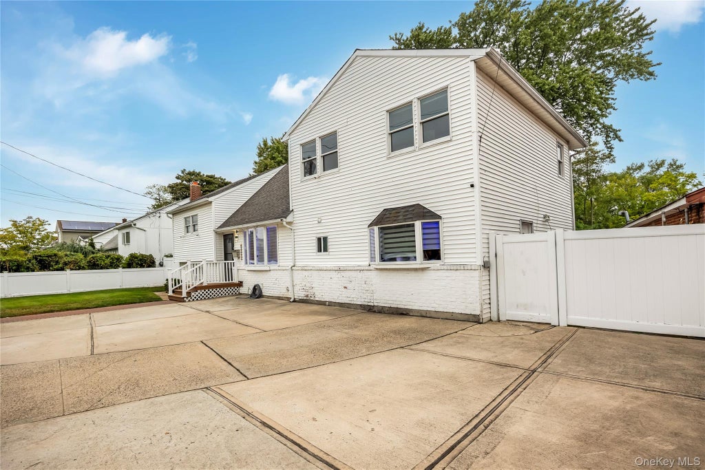 Photo of 204 Bayside Avenue, Oceanside, NY 11572 (MLS # 1048963)