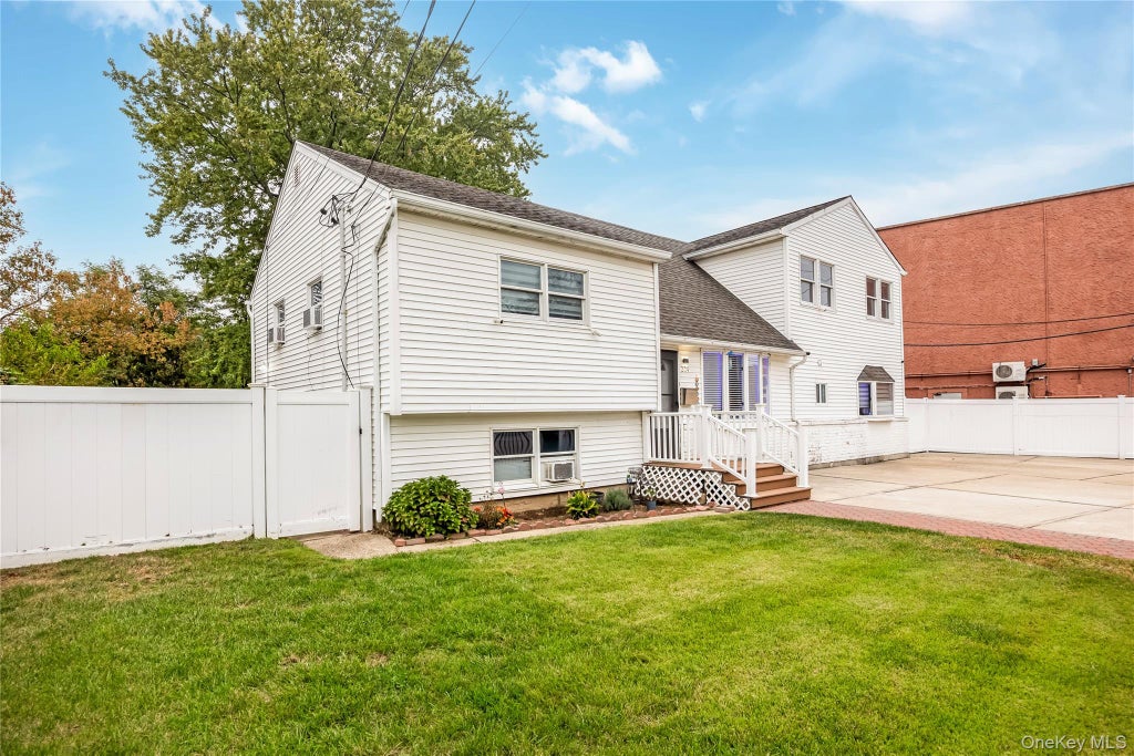 Photo of 204 Bayside Avenue, Oceanside, NY 11572 (MLS # 1048963)