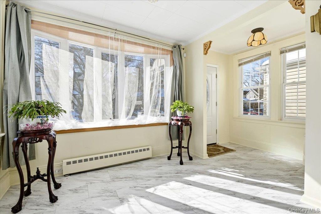 Photo of 69-27 Manse Street, Forest Hills, NY 11375 (MLS # 960720)