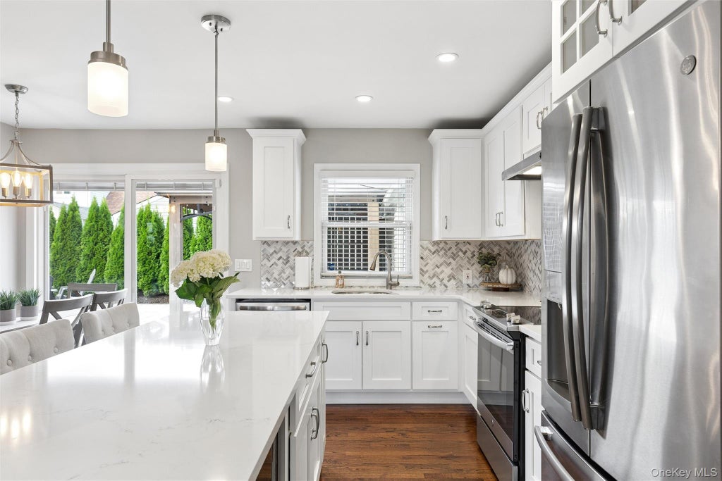 Photo of 24 Essen Place, Bethpage, NY 11714 (MLS # 1048613)