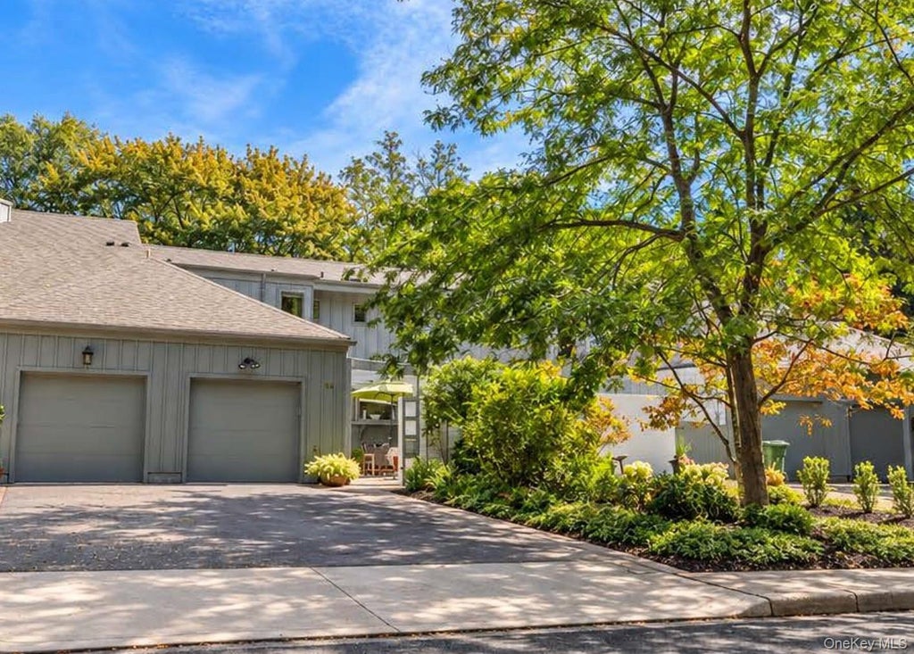 Photo of 55 Rockledge Path, Port Jefferson, NY 11777 (MLS # 1058341)