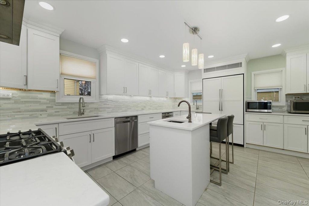 Photo of 422 Cedarhurst Avenue, Cedarhurst, NY 11516 (MLS # 946193)