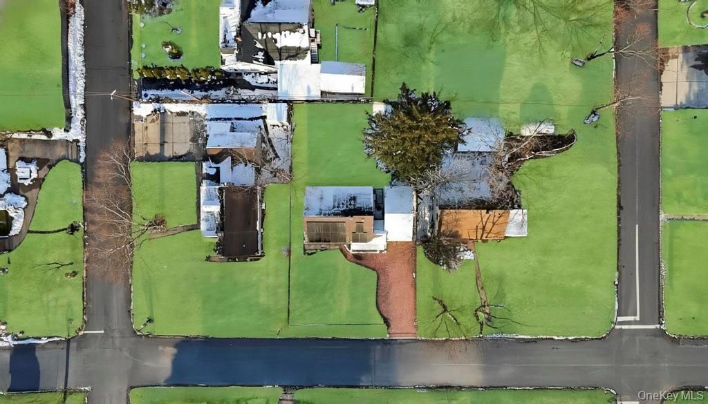 Photo of 66 Maplewood Drive, Westbury, NY 11590 (MLS # 945131)