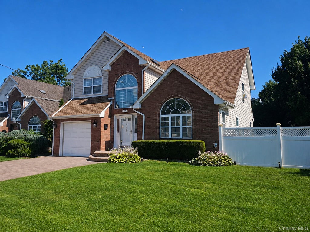Photo of 126 Washington Avenue, Roosevelt, NY 11575 (MLS # 1043743)