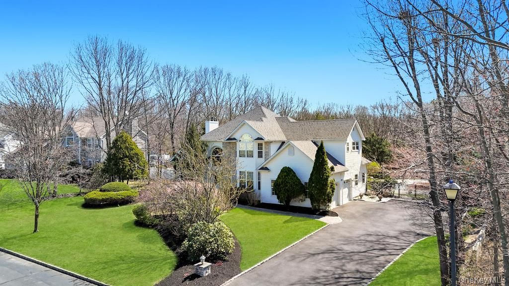 Photo of 7 Stadium Boulevard, East Setauket, NY 11733 (MLS # 987839)