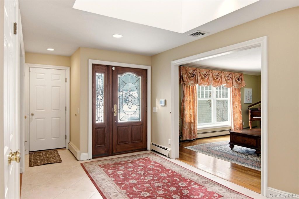 Photo of 69 Tamarack Street, East Northport, NY 11731 (MLS # 963910)