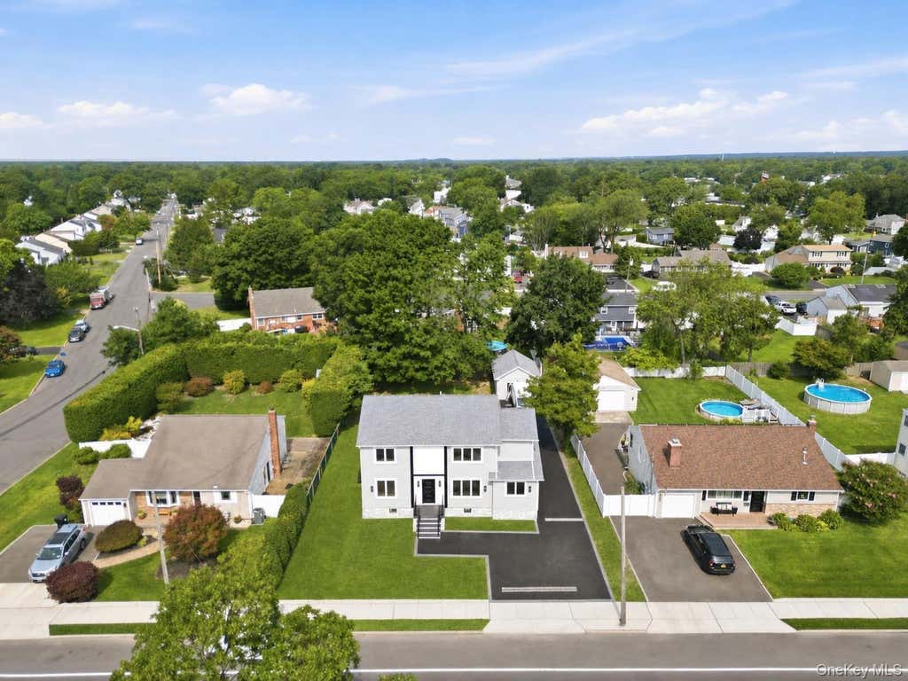 Photo of 136 Udall Road RD, West Islip, NY 11795 (MLS # 1033032)