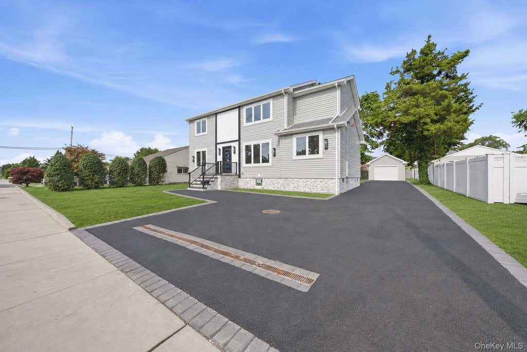 Photo of 136 Udall Road RD, West Islip, NY 11795 (MLS # 1033032)