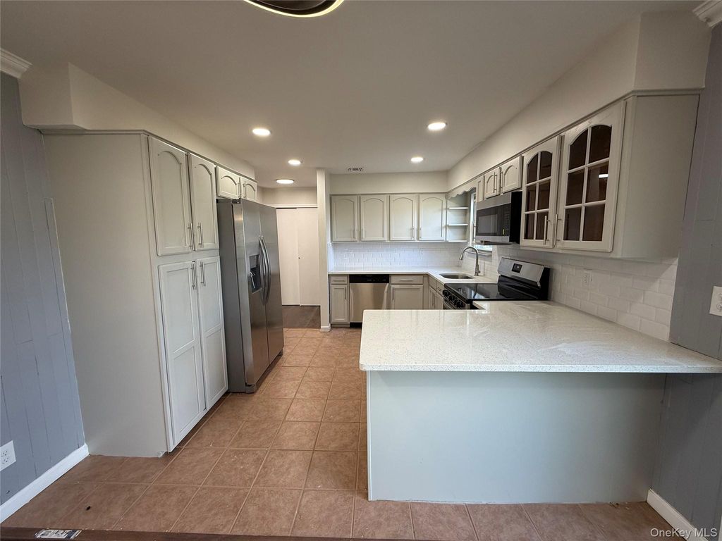 Photo of 39 2nd Place, Central Islip, NY 11722 (MLS # 922199)