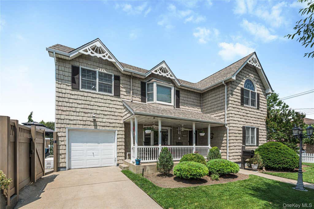 Photo of 87-17 157th Avenue, Howard Beach, NY 11414 (MLS # 1029234)