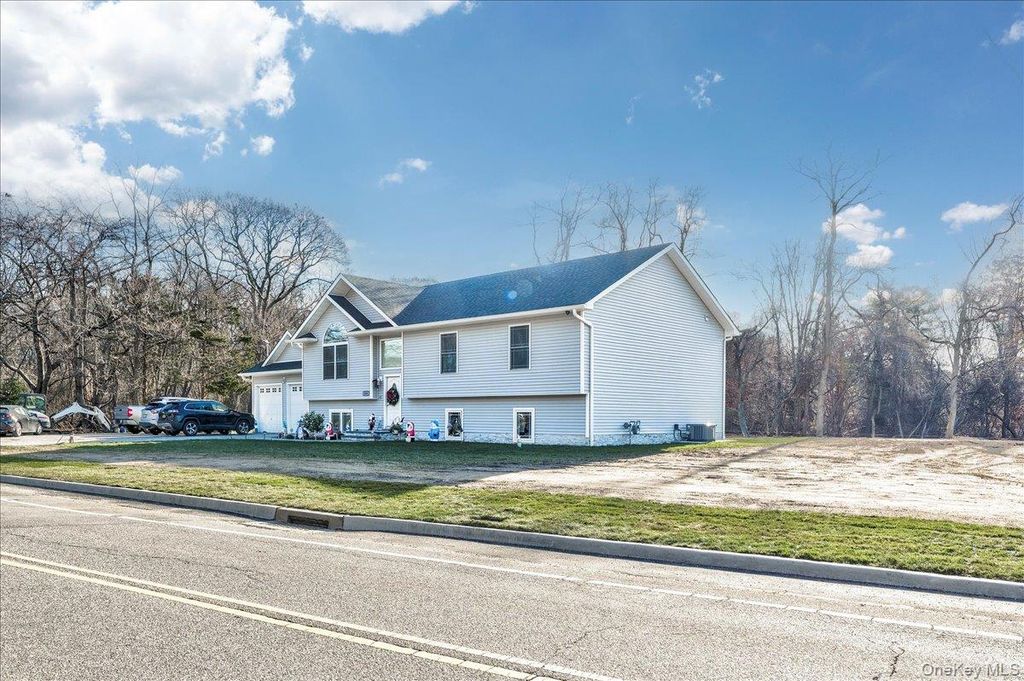 Photo of 468 Granny Road, Medford, NY 11763 (MLS # 943511)